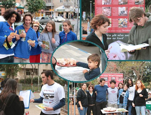 פעילי אנונימוס ועוברים ושבים מרוצים, בדוכן האוכל שהתקיים בתל אביב ביום ללא בשר 2007