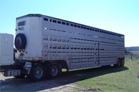 רכב דו-קומתי להובלת סוסים. 